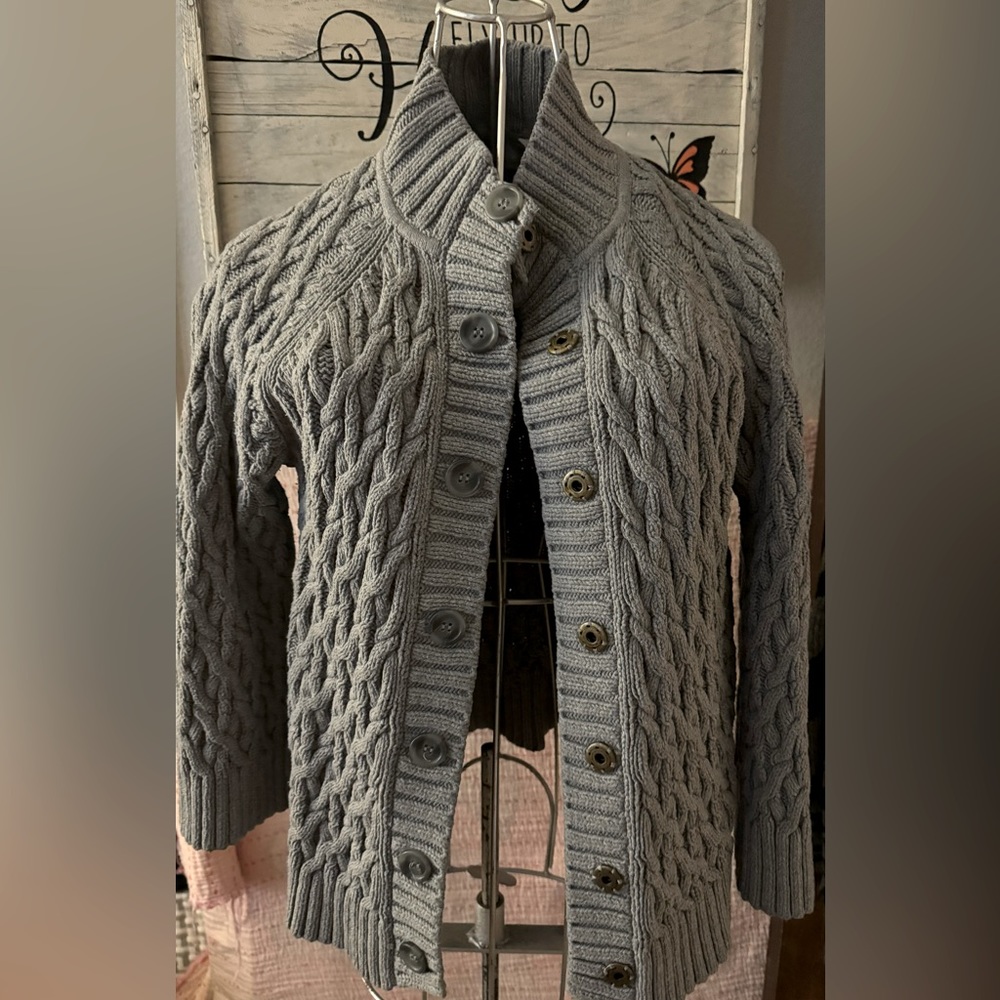 Cable sweater, size large.